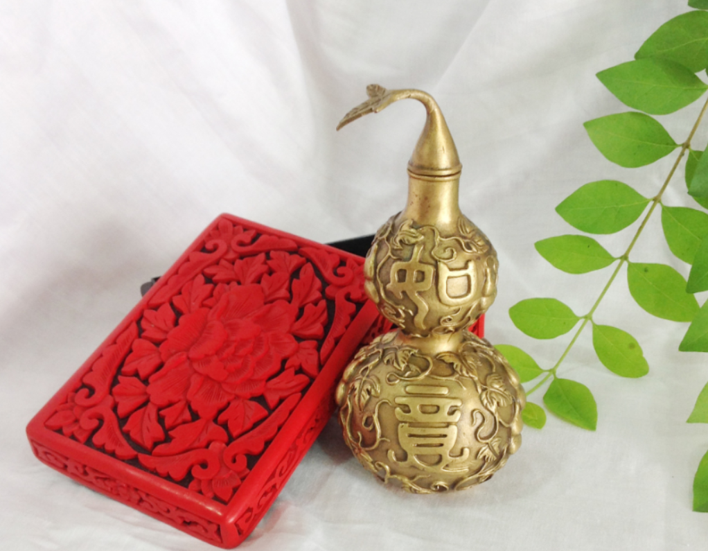 铜葫芦和天然葫芦在风水上的作用是什么?.png 铜葫芦和天然葫芦在风水上的作用是什么?.png